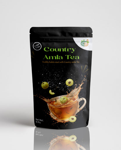 Country Amla Tea packaging with a black background and tea graphics.